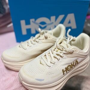 Hoka Women's Cream and Gold Bondi 9 Athletic Shoes